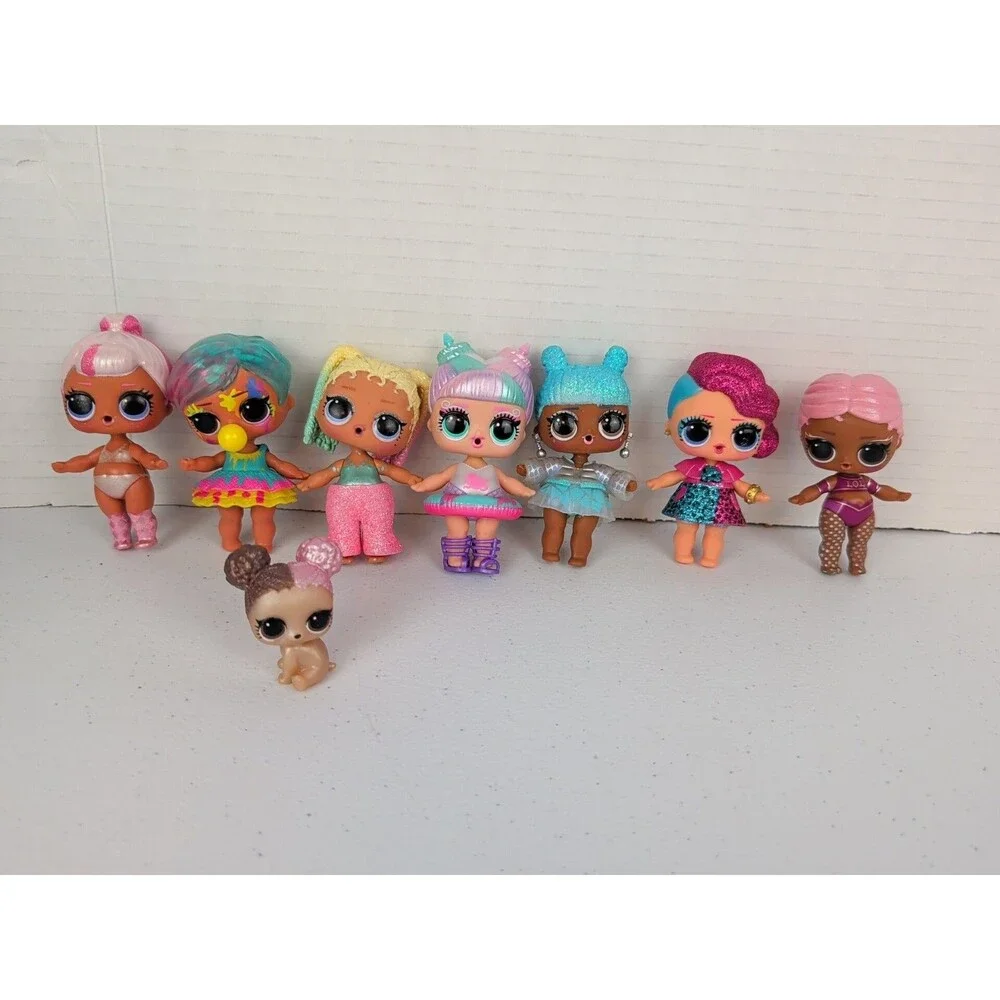 Lot of 8 LOL Surprise Dolls And Pet
